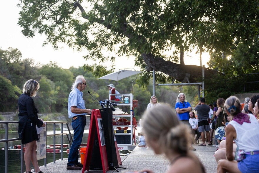 Don Gardner, a longtime Austin arborist, speaks at a celebration of life for Flo, a pecan tree at Barton Springs that will be removed due to a fungal infection, on Oct. 4, 2023, in Austin.