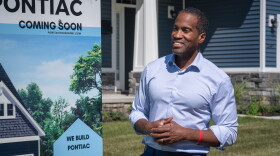 Congressman John James (R-MI10) stands outside of the newly constructed home in Pontiac.