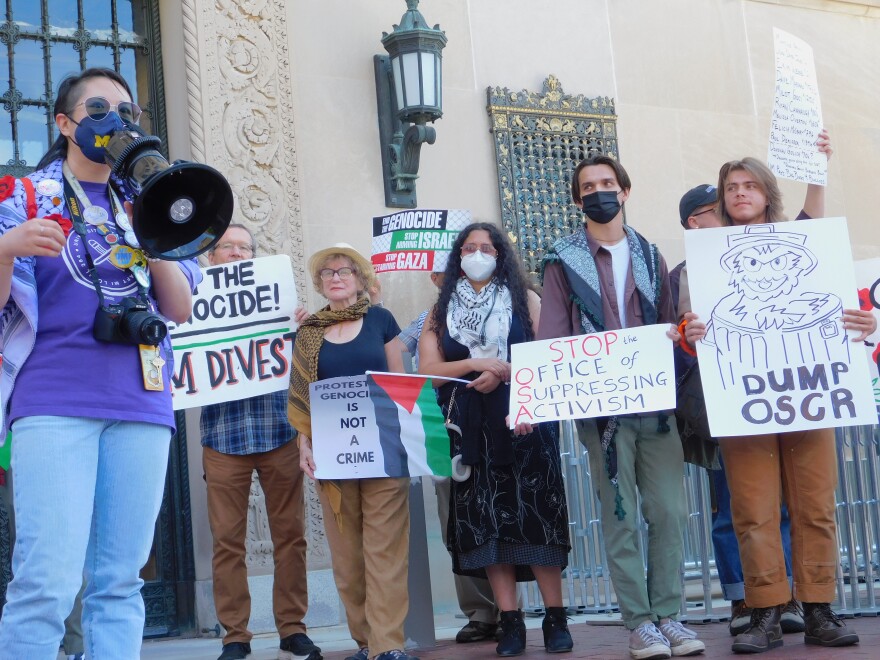 Activists gather on the Ann Arbor campus to criticize the University of Michigan's actions against individuals who have opposed the war in Gaza