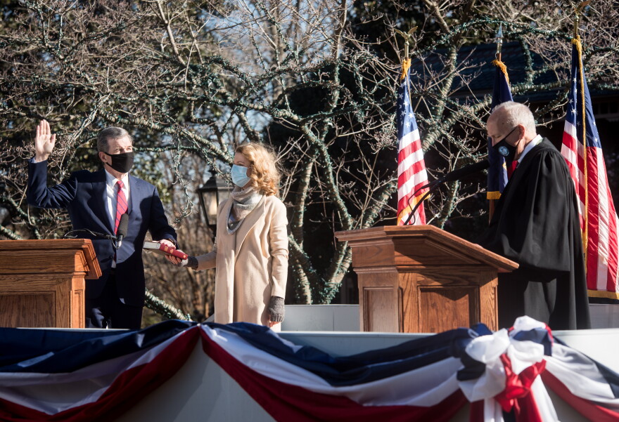 North Carolina Governor Roy Cooper takes the oath of office to be sworn in for his second term on Saturday, Jan. 9, 2021. The ceremony had limited in-person attendance due to COVID-19.