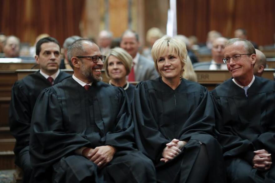 Iowa Supreme Court Justices Christopher McDonald, Susan Christensen and Edward Mansfield attend Iowa Gov. Kim Reynolds' Condition of the State address at the Statehouse in Des Moines, Iowa on Jan. 14, 2020.