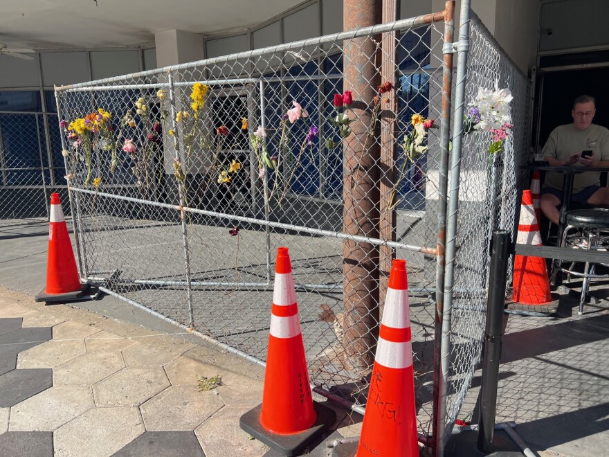 Flowers along the fencing outside Bradley's on 7th to memorialize the victims of the deadly Ybor City crash in November of 2025.