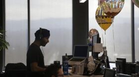 Employees work at their desks in Redwood City, Calif., Monday, Jan. 30, 2017. (Jeff Chiu/AP)