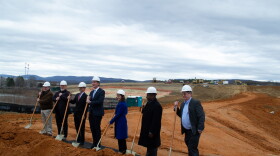 Gov. Glenn Youngkin (center) and Northrop Grumman CEO Kathy Warden (in blue) visited Waynesboro on Friday to speak at the groundbreaking ceremony of a new advanced electronics facility.