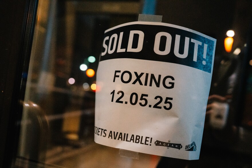 A sign noting a sold-out Foxing show is affixed to a door at Delmar Hall on Friday, Dec. 5, 2025, in St. Louis’ West End neighborhood.