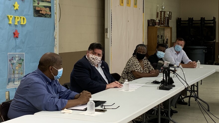 From left Rev. T. Ray McJunkins, Gov. J.B. Pritzker, Ald. Doris Turner, Ald. Shawn Gregory, and State Sen. Andy Manar gathered at Union Baptist Church in Springfield to talk about police reforms. 