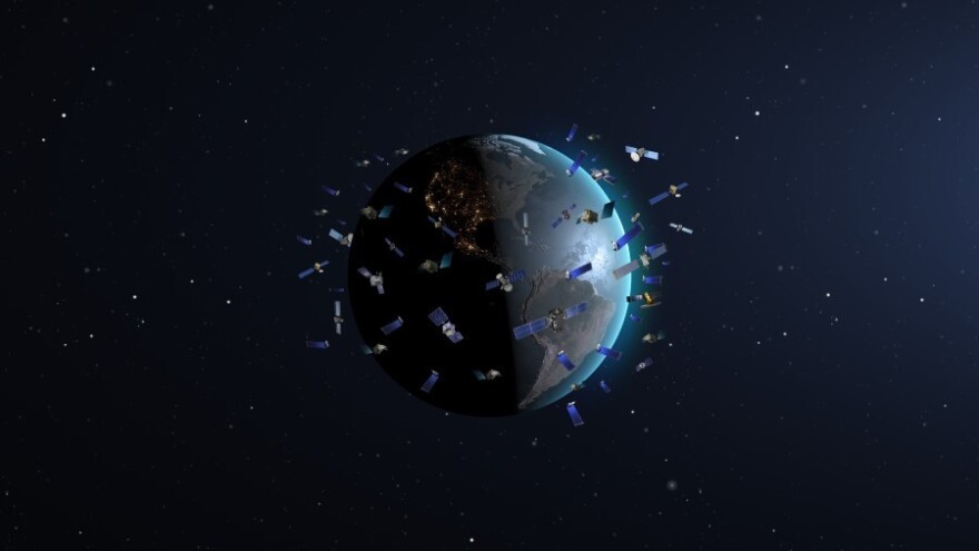 Constellation of satellites in low-Earth orbits (artist’s impression, not to scale) 