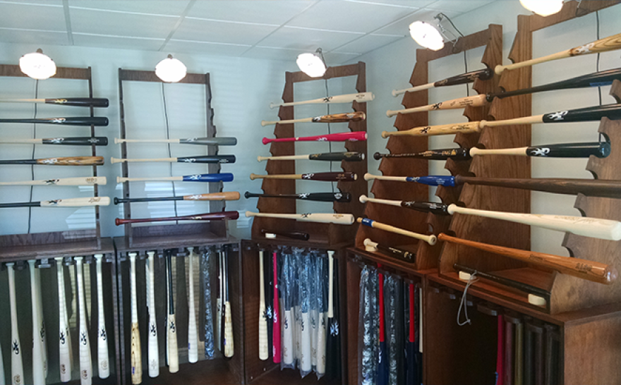 Racks of baseball bats at the Phoenix Bats factory in Plain City.