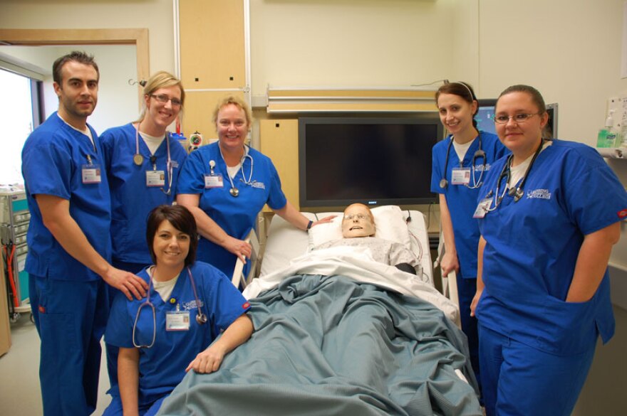 Second year nursing students Travis Pierce, Shelby Feldpausch, Staci Pierson (kneeling), Jennifer Meaton, Ashley Neybert and Jamie Hill. And of course, Mr. Pointer, center.