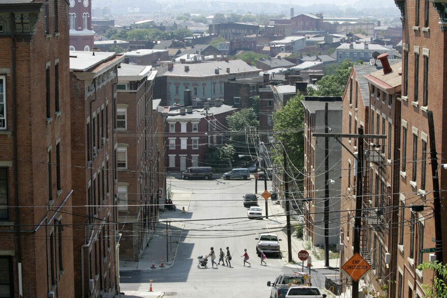 Children make their way home from a grade school in Over-the-Rhine in 2007, another year Cincinnati made the U.S. Census Bureau's list of poorest big cities.
