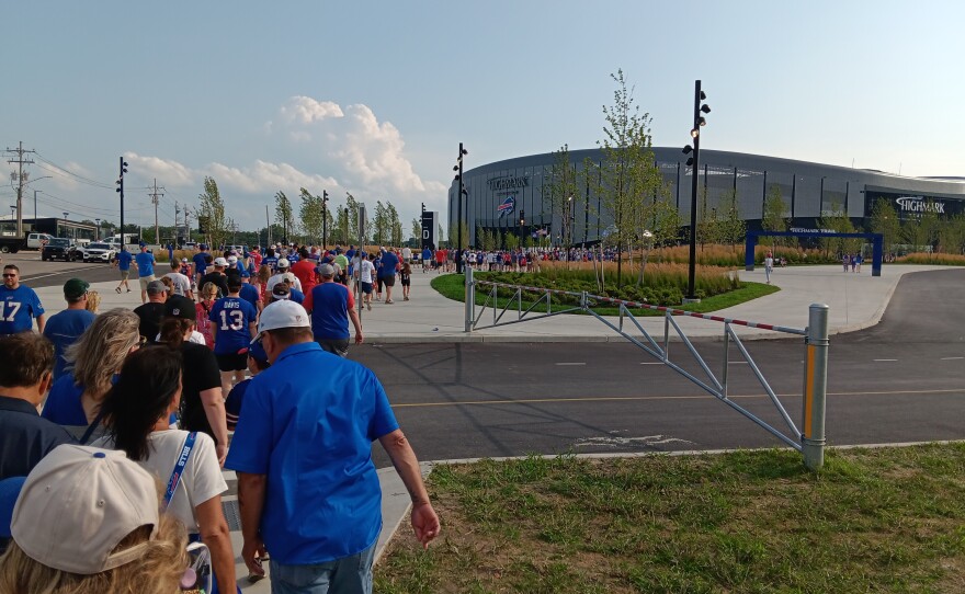 Fans approach Highmark Stadium Saturday, August 8, 2026 in advance of the Buffalo Bills 'Return of the Blue and Red' practice, the first public event to be held in the new stadium.