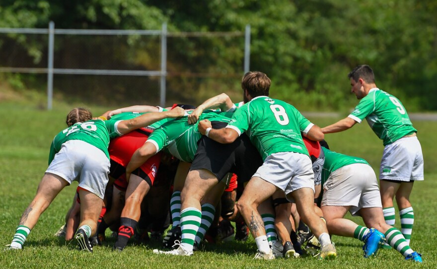 Players start in a scrum.