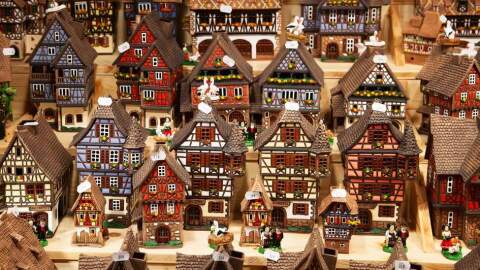 Traditional Alsatian houses on the Christmas market in Strasbourg, France.