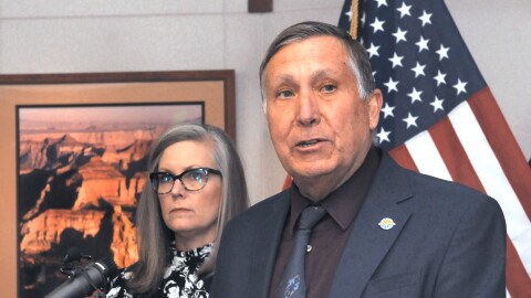 Arizona water chief Tom Buschatzke details new restrictions on development in the far fringes of the Phoenix area due to groundwater shortage. With him is Gov. Katie Hobbs.