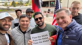 Army veteran Matt Zeller (right) with Afghan refugees and supporters of the Afghan Adjustment Act.