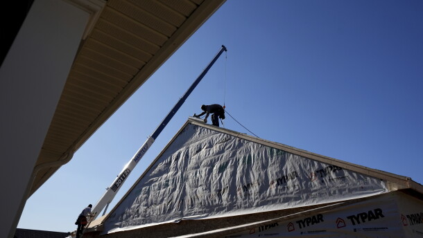 Construction workers frame a new single-family home Friday, Dec. 6, 2024, in Owensboro, Ky.