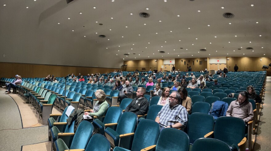 About 100 people gathered in the auditorium at Lincoln Middle School to speak and listen about the closure of Greenhaven Elementary School at a March 26, 2026, public hearing in Hibbing.