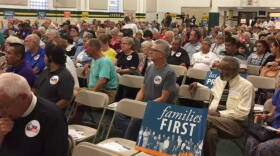 Faith leaders and community activists gathered Wednesday evening to rally against the federal budget soon up for consideration in Congress.