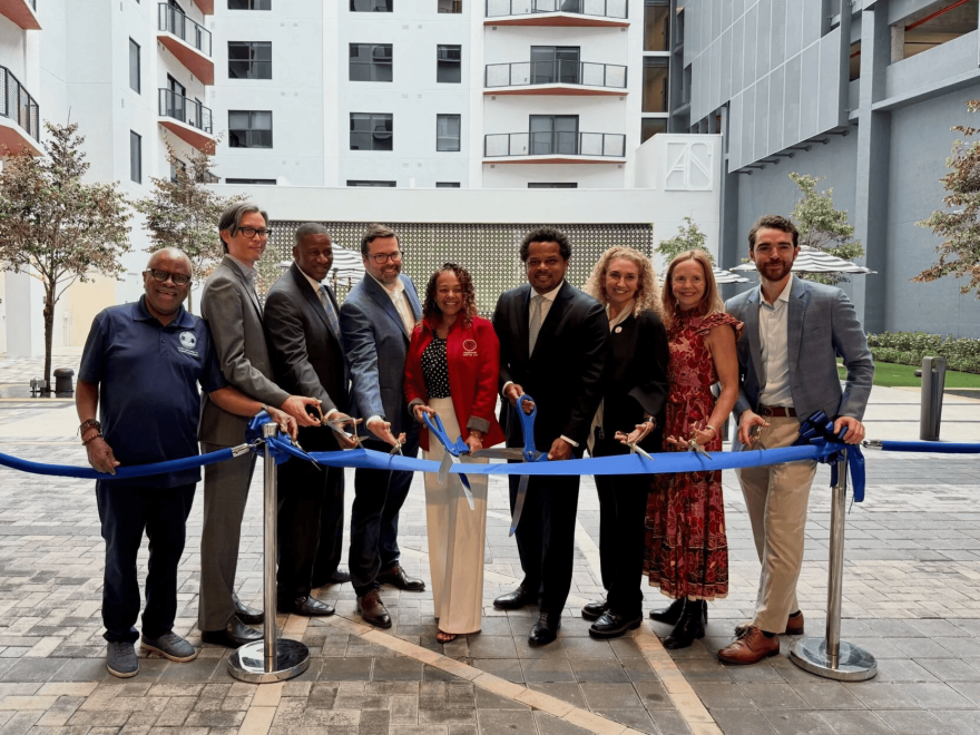 SEOPW CRA members during a ribbon cutting for affordable housing in Overtown.