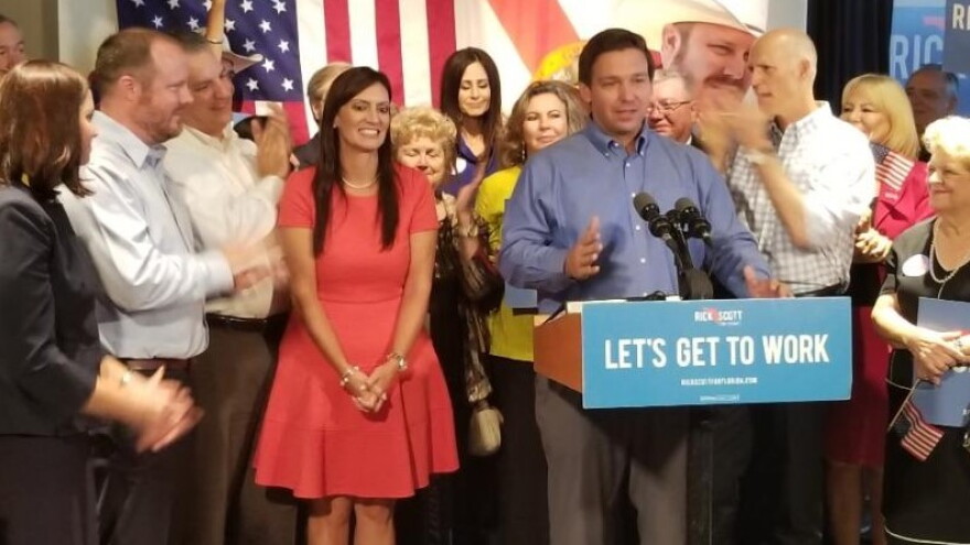 Ron DeSantis (at podium) is pictured last week announcing his running mate, State Rep. Jeanette Nunez (left). 