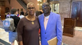 Lille Smalls, left, and her husband Carl Smalls Sr., right, pose at the South Carolina Statehouse after a news conference to speak about the killer of their son getting a deal to knock 16 years off his 35-year sentence for murder on Tuesday, April 25, 2023, in Columbia, S.C. The South Carolina Supreme Court canceled the deal on Wednesday, April 26, 2023, after a hearing. (AP Photo/Jeffrey Collins)