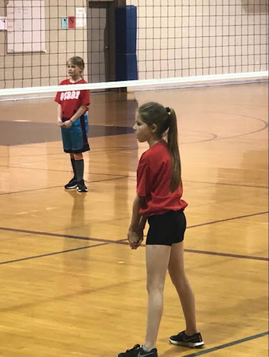 Young Kendall Michels at volleyball practice.