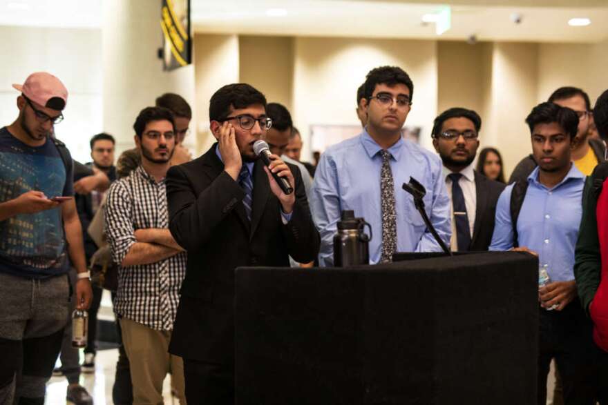 Student imam Abdullah Saqib led the call to prayer at the University of Central Florida vigil for the victims of the Christchurch shooting. (Rachel Harris, UCF)