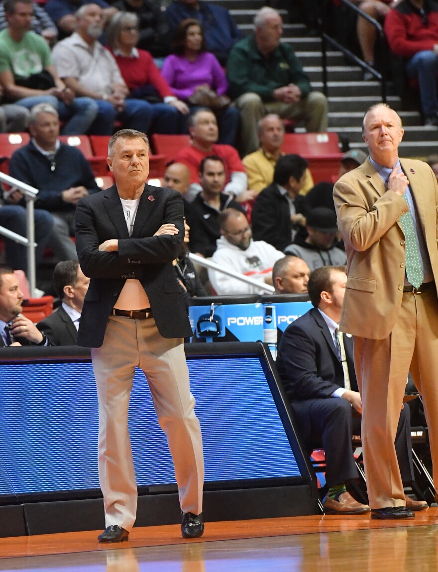 Coach Dan D'Antoni on the sidelines at the Cam Henderson Center