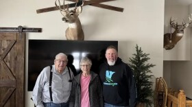 Dennis, Mary and Dave Garry pose in the living room of their home in Pennington County, Minn., on Jan. 31. Dave is the only child who stayed to take care of the family farm, and he hopes someone returns to the farm so they can carry the legacy forward.