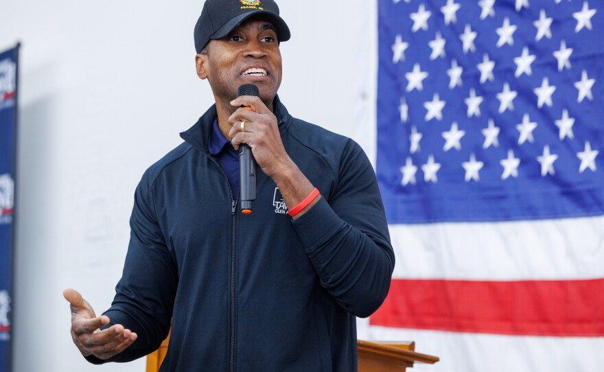 Republican nominee for governor John James speaks to volunteers in Lansing Township, Mich., on Oct. 24, 2026, during a stop on Republican U.S. Senate nominee Mike Rogers' "We Have a State to Save" bus tour.