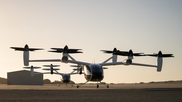 Two of Joby's prototype electric air taxi aircraft at the company's flight test and manufacturing facilities in Marina, California. Joby Aviation photo
