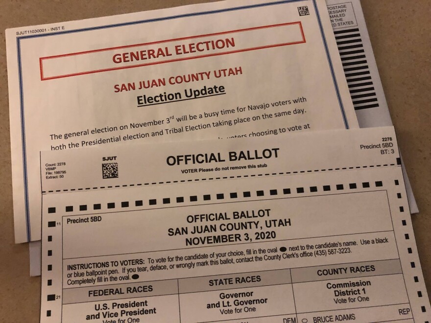 An envelope that says General Election, San Juan County Utah in the background. A paper that says “official ballot” in the foreground. 
