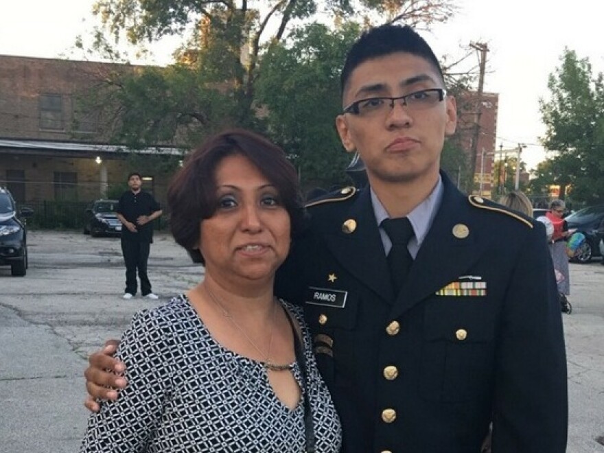 Lewis Ramos, 22, an operations specialist in the U.S. Army National Guard, stands with his mother, Rosa Elena Ramos, who arrived illegally 30 years ago from Mexico. He recently learned she would receive the protection by the time he leaves later this month. [Courtesy of Michael Jarecki]