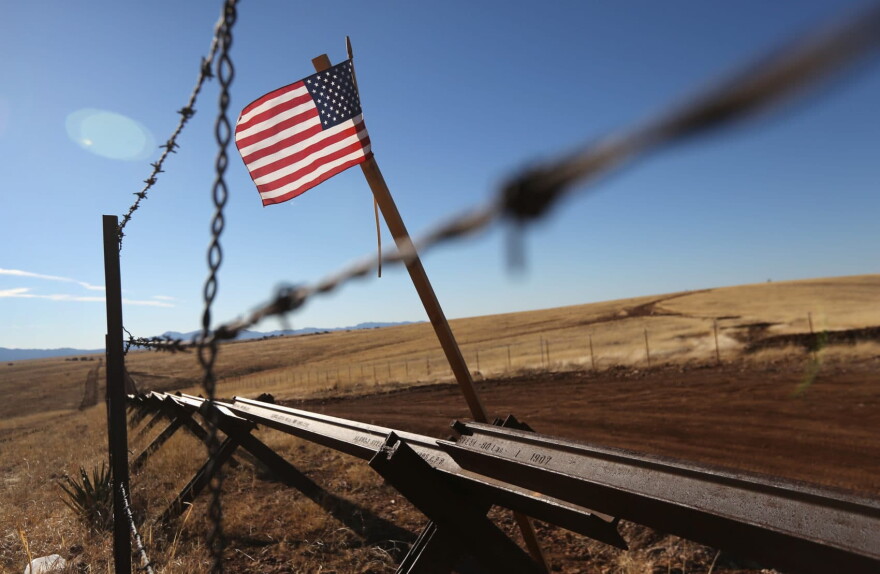 An American flag flies at the U.S.-Mexico border near Sonoita, Ariz. (John Moore/Getty Images)