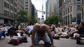 Protesters in downtown Indianapolis stage a "die in" to draw attention to police brutality during the 2020 Black Lives Matter protests.