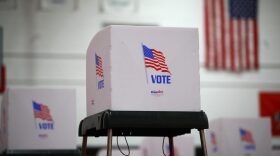 A privacy booth is seen at a polling station located in the Baltimore City Community College (BCCC) Gymnasium in Baltimore, during early voting in Maryland, U.S., October 26, 2020. REUTERS/Hannah McKay