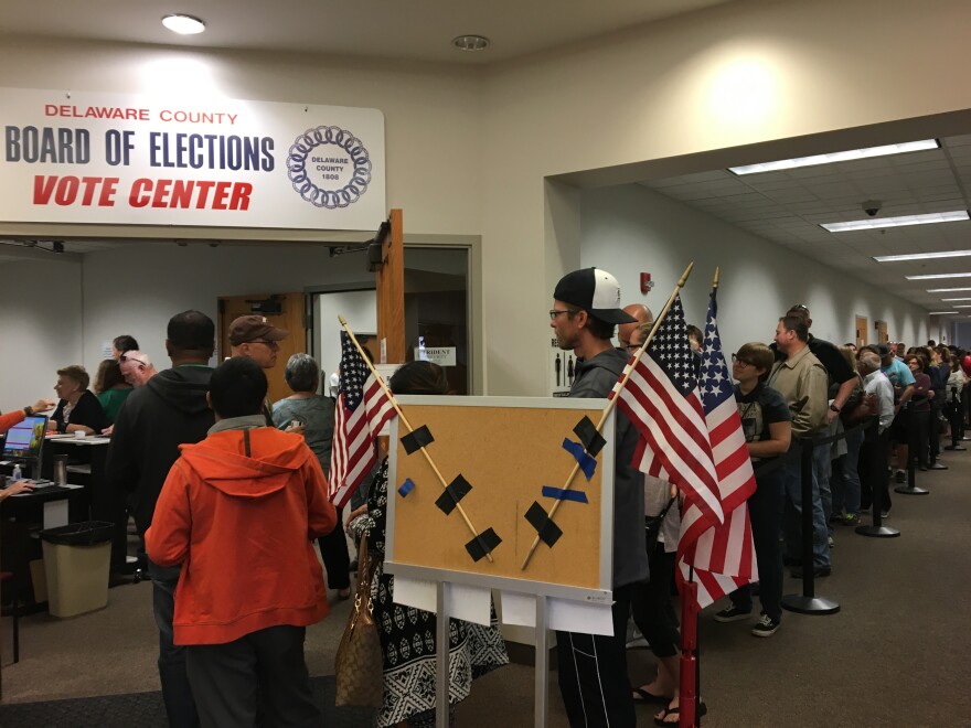 photo of people voting