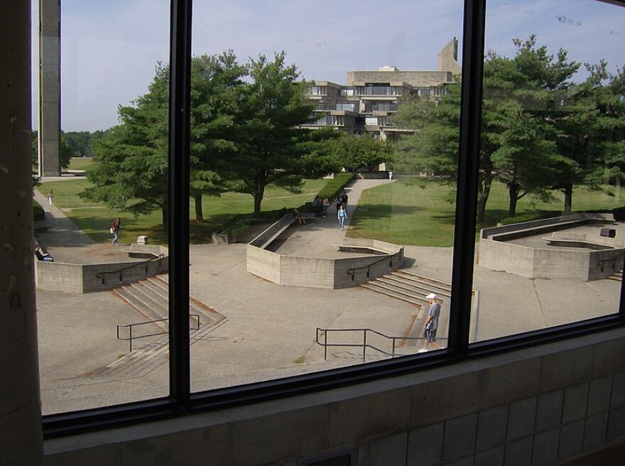 Benches and stairs as seen from the catwalk between the Campus Center and the Liberal Arts Building on the UMass Dartmouth campus. 