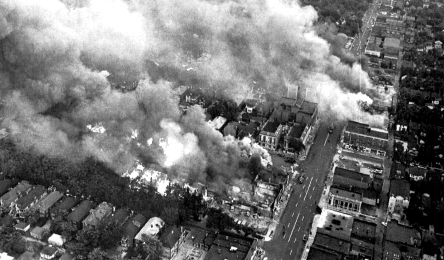 On July 24, 1967, multiple fires burn about three miles west of the downtown area.