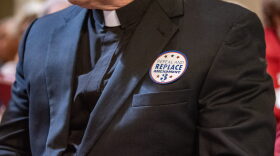 Stickers saying “repeal and replace Amendment 3” are distributed during Missouri Right to Life advocacy day at the Missouri State Capitol on March 26, 2025.
