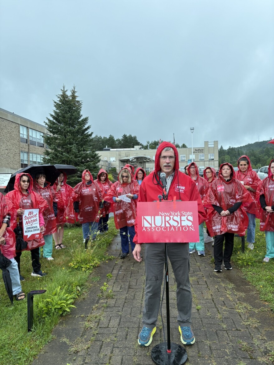 Bargaining Unit President Bill Schneider leads a nurses rally outside the Adirondack Medical Center 