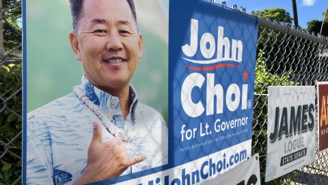 A sign for John Choiʻs lieutenant governor campaign hangs on a fence on Pali Highway in Honolulu on Thursday, June 23, 2026.