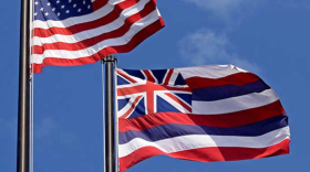 The U.S. flag is captured next to the Hawaiʻi state flag.