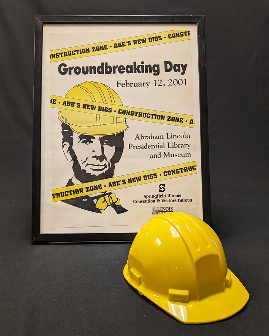 A poster promoting the 2001 groundbreaking for the Abraham Lincoln Presidential Library and Museum.