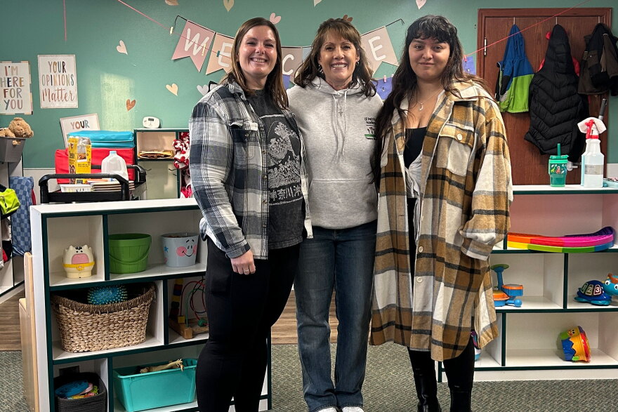 Patti McMullan stands between Brenna Becton and Nadia Segura, who were both interns. Now, Brenna is a lead teacher and Nadia is an assistant teacher at McMullan's daycare and early learning business. 
