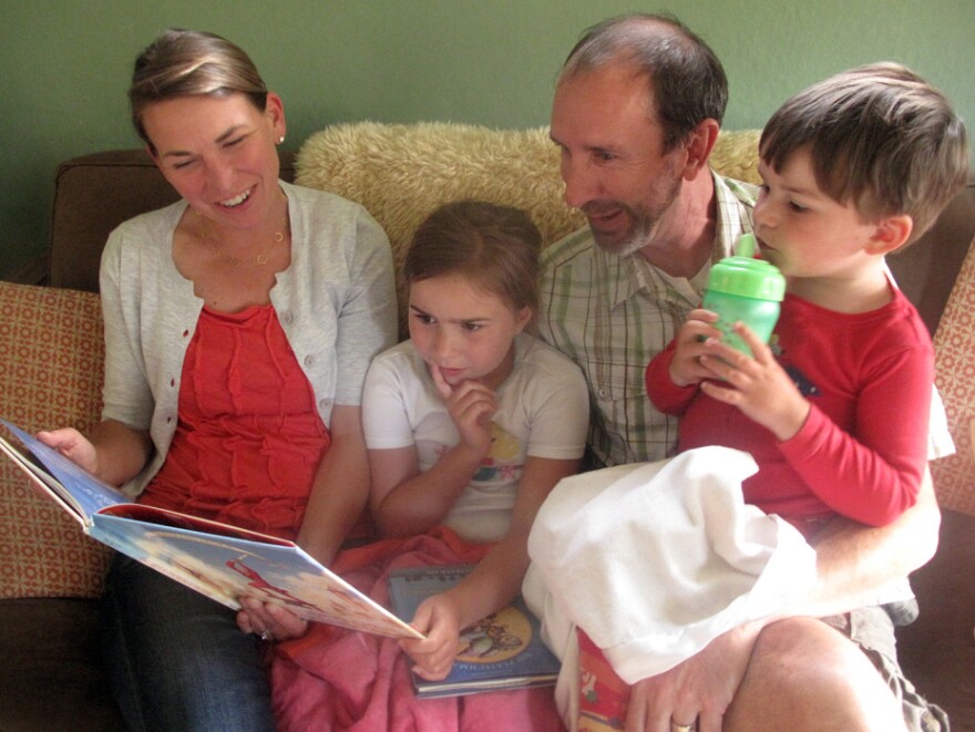 For Stephanie Upp, shown here with her husband, Ben Corson, with their two children, Clare and Calder, there was "never a question that I would have a richer life than I grew up with."