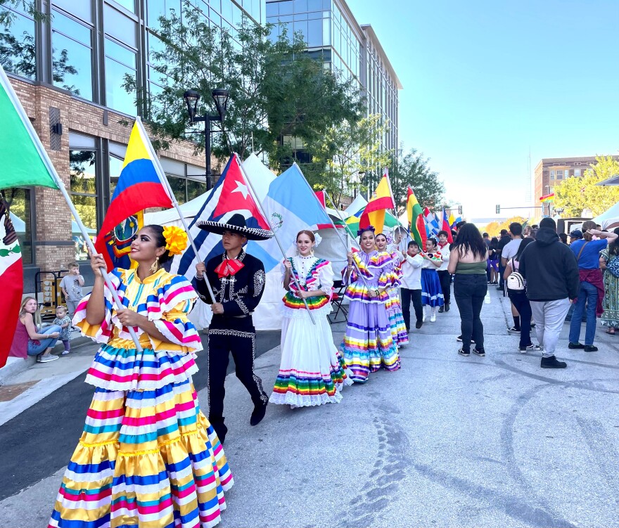 Performers paraded the flags of Latino countries at the opening of Iowa's Latino Heritage Festival on Saturday, Sept. 25.