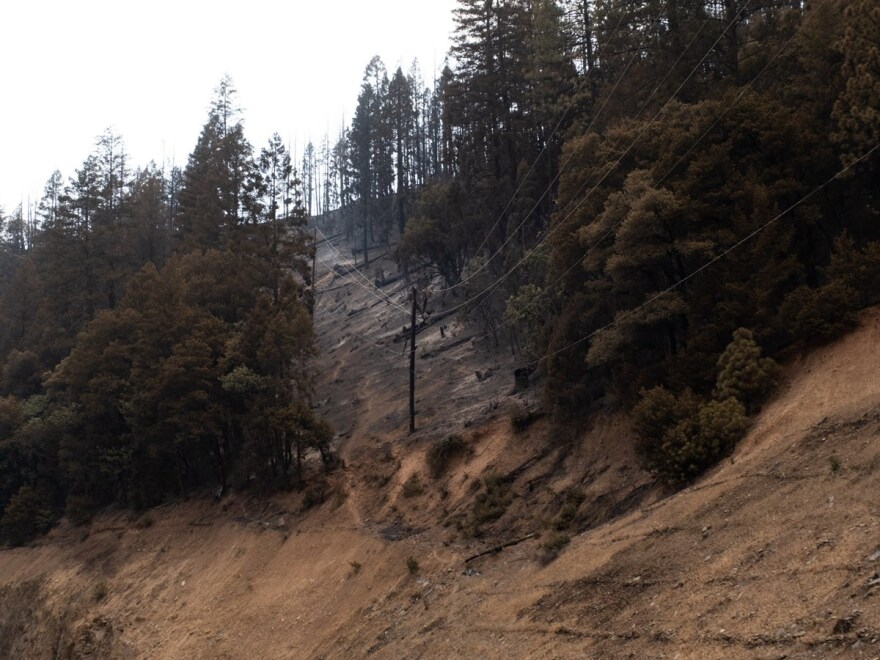 The Dixie Fire, visible from Highway 70, along the Feather River on Wednesday, July 20, 2021.