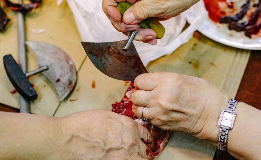 Traditionally, the women and children in the community eat with an ulu knife.