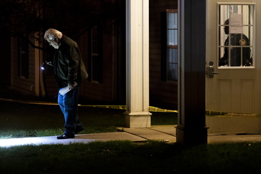 Portage County Sheriff Office deputies and Kent police search the grounds of Pebblebrook Apartments following a shooting Sunday night. 